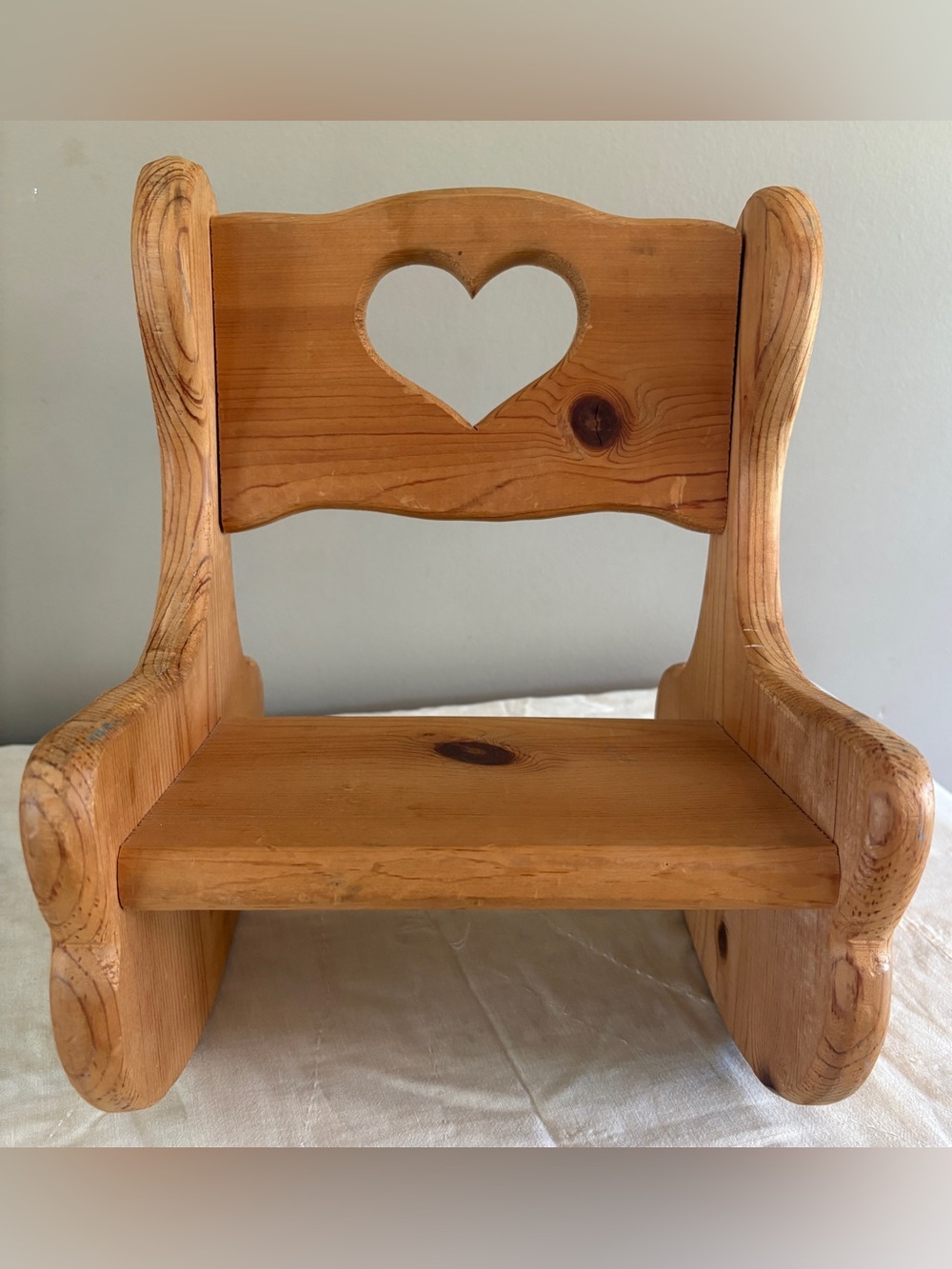 Wooden rocking chair with heart cutout for doll or plant stand